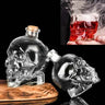 Skull whisky crystal bottle with two matching glasses, showcasing bold and edgy skull-inspired design on a wooden surface.