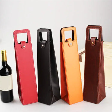 Four elegant wine bottle bags in faux leather and flocked fabric, displayed in red, black, orange, and brown colors.