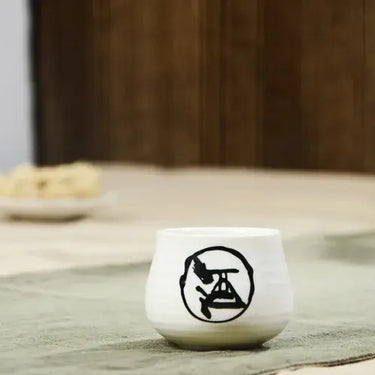 Traditional Japanese Ochoko Cup from Sake Set on Table with Elegant Design