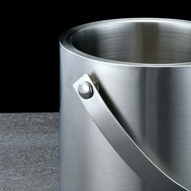 Stainless steel insulated ice bucket with handle, perfect for home bars, picnics, and parties.