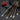 Stainless Steel Long Handle Mixing Spoons in various colors on a dark kitchen surface with cherry tomatoes nearby